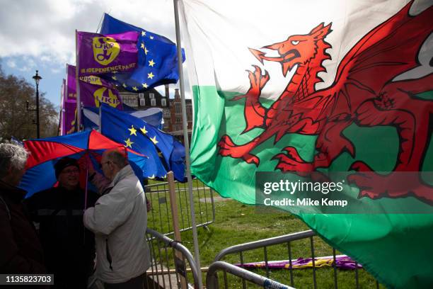 Anti Brexit, protesters with a Welsh flag in Westminster as the leader of the opposition and the Prime Minister continue talks to solve the Brexit...