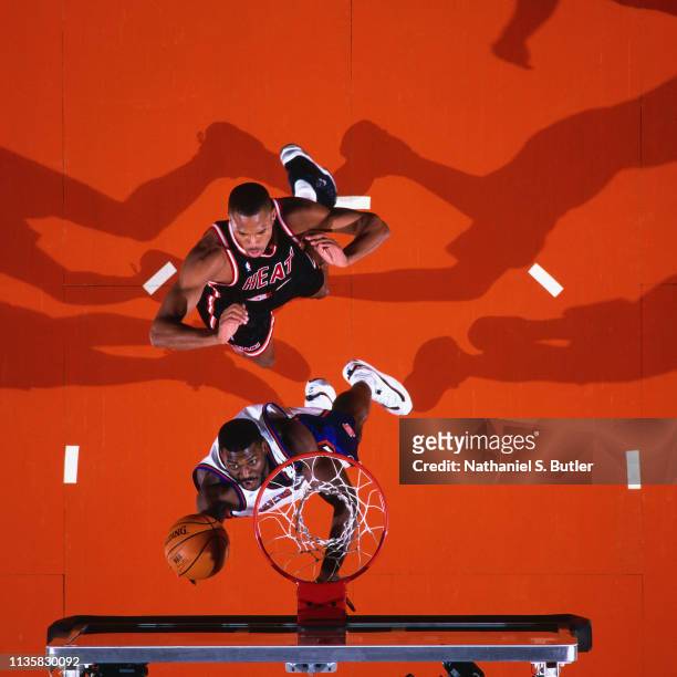 Larry Johnson of the New York Knicks shoots the ball against the Miami Heat on February 7, 1999 at the Madison Square Garden in New York, New York....