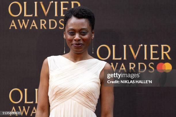 British playwright Natasha Gordon poses on the red carpet upon arrival to attend The Olivier Awards at the Royal Albert Hall in central London on...