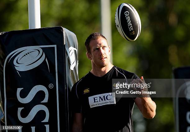 Richard Birkett of London Wasps runs a Guinness Club Together training session for Staines at the Reeves on 3 May 2011 in Staines, England. To win a...