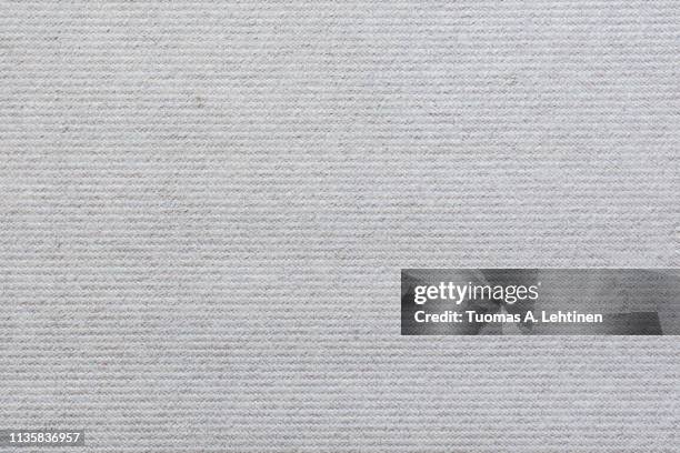 full frame background of a light, almost white, carpet viewed from above. - tapijt stockfoto's en -beelden