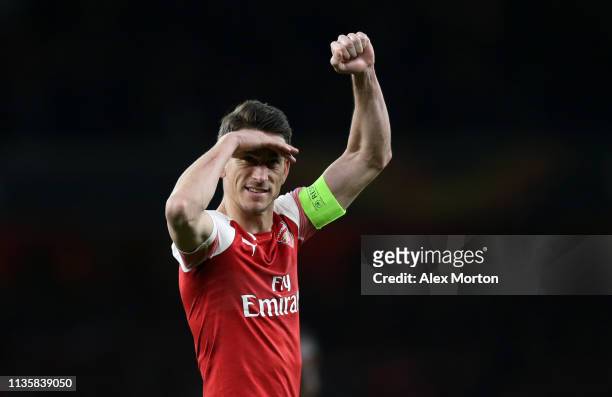 Laurent Koscielny of Arsenal celebrates after the UEFA Europa League Round of 16 Second Leg match between Arsenal and Stade Rennais at Emirates...