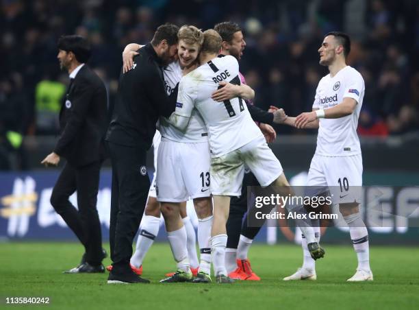 Martin Hinteregger of Eintracht Frankfurt celebrates with Sebastian Rode of Eintracht Frankfurt and teammates at full-time of the UEFA Europa League...