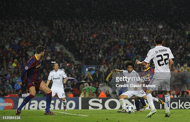 Marcelo of Real Madrid scores during the UEFA Champions League Semi Final second leg match between Barcelona and Real Madrid at the Camp Nou on May...