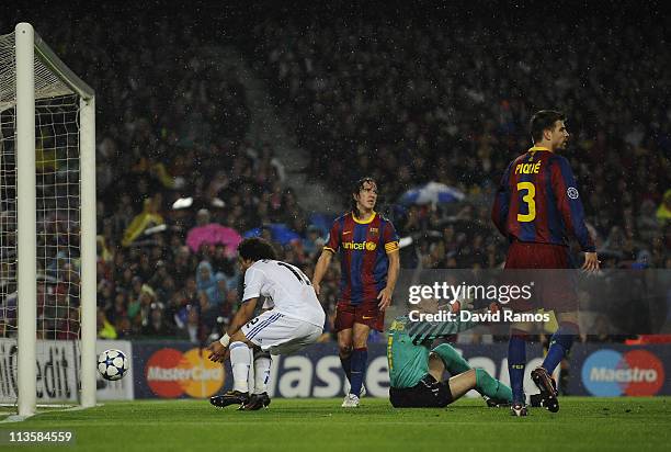 Marcelo of Real Madrid goes for the ball after scoring his team's first goal during the UEFA Champions League Semi Final second leg match between...