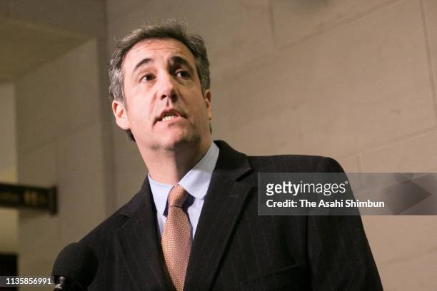 Michael Cohen, former attorney and fixer for President Donald Trump, walks out of a closed door House Intelligence Committee hearing in the basement...