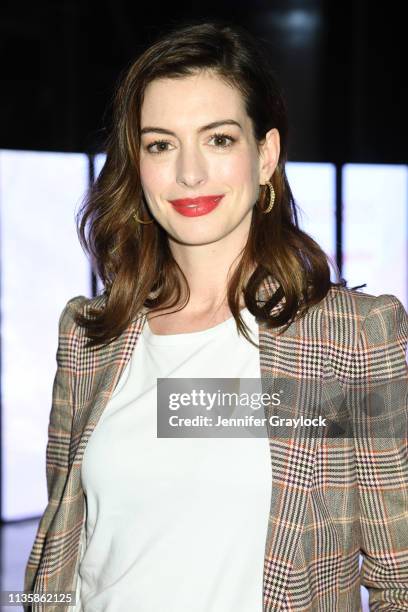 Anne Hathaway attends the Watches Of Switzerland Hudson Yards opening on March 14, 2019 at Hudson Yards in New York City.