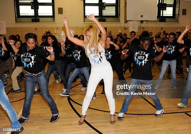 Beyonce surprises students at PS/MS 161 in Harlem as part of First Lady Michelle Obama's "Let's Move" initiative to fight childhood obesity. The...