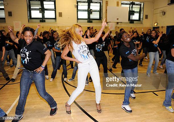 Beyonce surprises students at PS/MS 161 in Harlem as part of First Lady Michelle Obama's "Let's Move" initiative to fight childhood obesity. The...