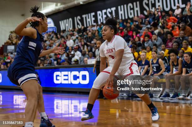 St Johns Cadets guard Alex Cohan during the Geico National High School basketball tournament semifinal round game between the Centennial Bulldogs and...