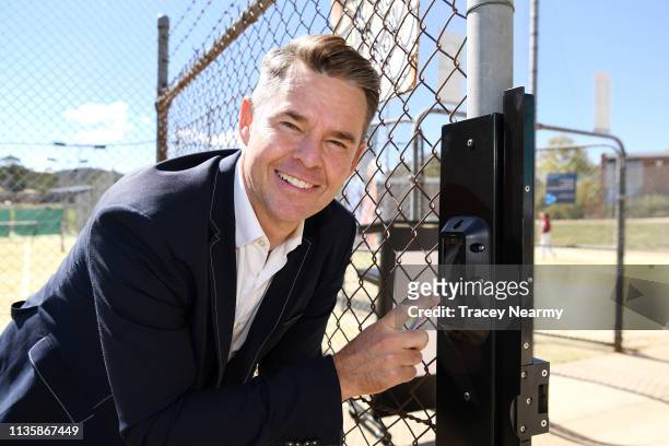 Australian tennis champion Todd Woodbridge OAM poses with a new digital access system for Australian tennis clubs during a Tennis Australia Media...