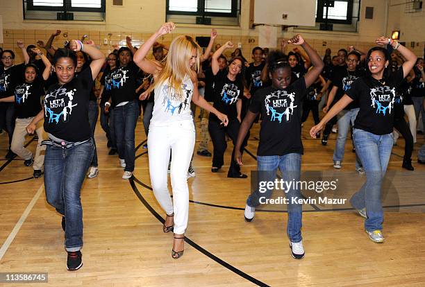 Beyonce surprises students at PS/MS 161 in Harlem as part of First Lady Michelle Obama's "Let's Move" initiative to fight childhood obesity. The...