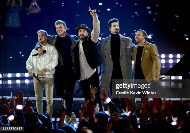 Brian Littrell, Nick Carter, AJ McLean, Kevin Richardson, and Howie Dorough of Backstreet Boys perform on stage at the 2019 iHeartRadio Music Awards...