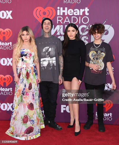 Alabama Barker, Travis Barker, Atiana De La Hoya and Landon Asher Barker arrive at the 2019 iHeartRadio Music Awards which broadcasted live on FOX at...