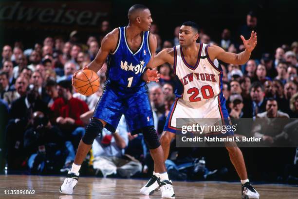 Penny Hardaway of the Orlando Magic handles the ball against Allan Houston of the New York Knicks on March 18, 1999 at Madison Square Garden in New...