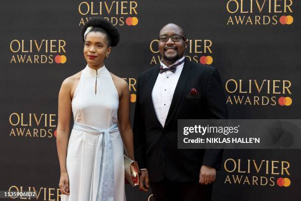 British opera singer Rachel Oyawale and South African opera singer Njabulo Madlala pose on the red carpet upon arrival to attend The Olivier Awards...