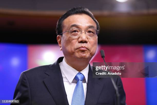 Chinese Premier Li Keqiang speaks during a press conference held with European Commission President Jean-Claude Juncker and European Council...