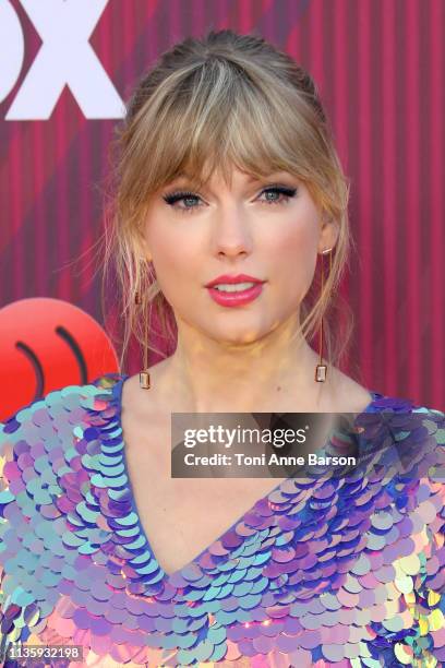 Taylor Swift arrives at the 2019 iHeartRadio Music Awards which broadcasted live on FOX at Microsoft Theater on March 14, 2019 in Los Angeles,...