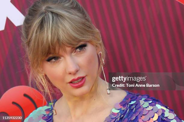 Taylor Swift arrives at the 2019 iHeartRadio Music Awards which broadcasted live on FOX at Microsoft Theater on March 14, 2019 in Los Angeles,...