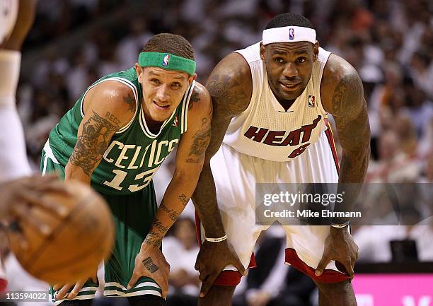 LeBron James of the Miami Heat talks with Delonte West of the Boston Celtics during Game Two of the Eastern Conference Semifinals of the 2011 NBA...