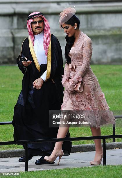 Suadi Prince Al-Waleed bin Talal and Princess Ameerah exit after the wedding of Their Royal Highnesses Prince William Duke of Cambridge and Catherine...