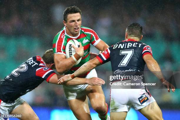 Sam Burgess of the Rabbitohs runs the ball during the round one NRL match between the Sydney Roosters and the South Sydney Rabbitohs at Sydney...