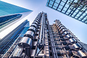 Abstract modern business buildings in financial district of London, England - stock image