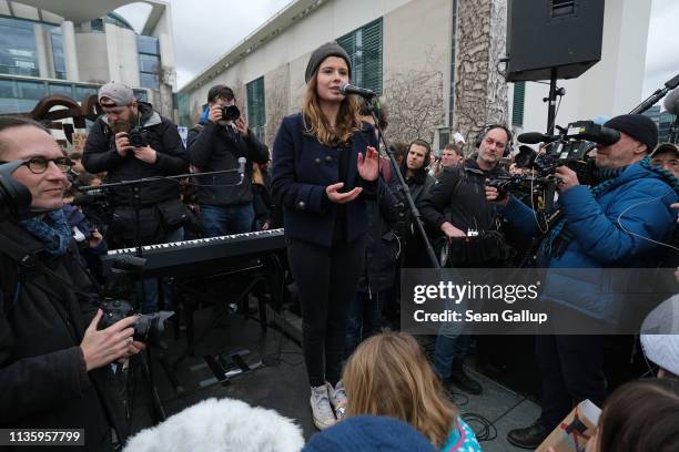 Climate activist Luisa Neubauer speaks at a FridaysForFuture climate protest march outside the Chancellery on March 15, 2019 in Berlin, Germany....