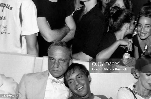 Photo of American attorney Roy Cohn and businessman & nightclub owner Steve Rubell as they sit together at the Mudd Club, New York, New York, 1979....