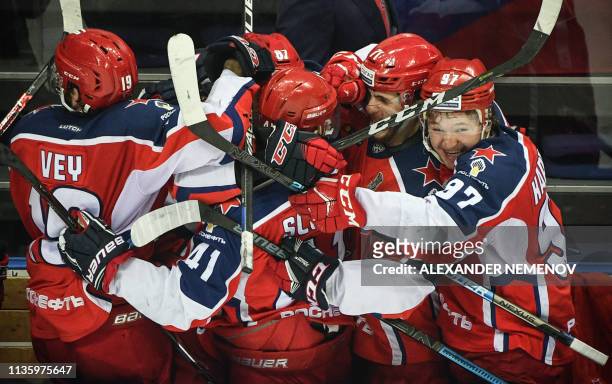 Moscow's players celebrate their victory over SKA St Petersburg during the Western Conference final series of Gagarin Cup 2019 of the Russian...