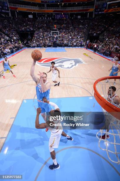 Kosta Koufos of the Sacramento Kings shoots against David Nwaba of the Cleveland Cavaliers on April 4, 2019 at Golden 1 Center in Sacramento,...