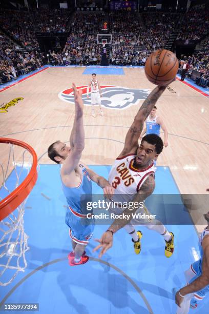 Marquese Chriss of the Cleveland Cavaliers dunks against Kosta Koufos of the Sacramento Kings on April 4, 2019 at Golden 1 Center in Sacramento,...