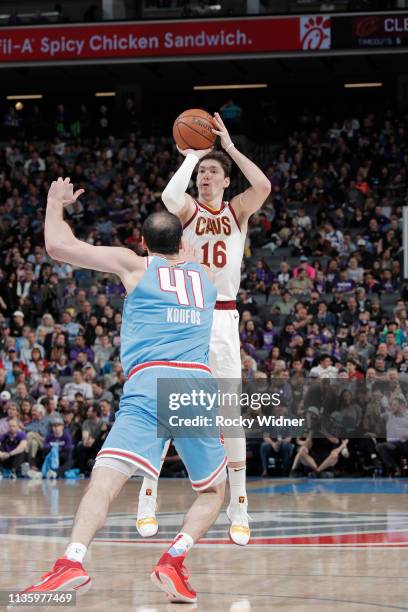 Cedi Osman of the Cleveland Cavaliers shoots against Kosta Koufos of the Sacramento Kings on April 4, 2019 at Golden 1 Center in Sacramento,...