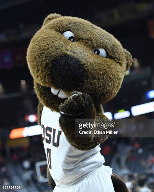 The Oregon State Beavers mascot Benny the Beaver poses before a quarterfinal game of the Pac-12 basketball tournament against the Colorado Buffaloes...