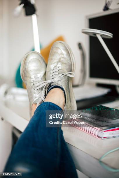 feet on desk - woman sleeping table stock pictures, royalty-free photos & images