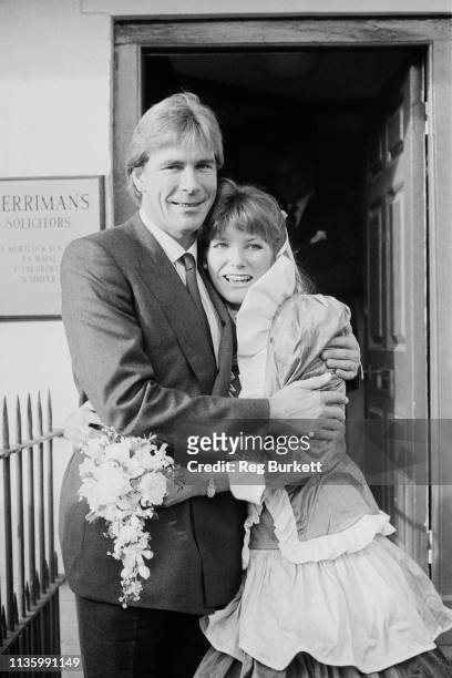 British racing driver James Hunt and Sarah Lomax on their wedding day in Marlborough, UK, 17th December 1983.