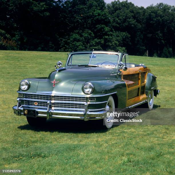 1980s 1948 CHRYSLER TOWN AND COUNTRY CONVERTIBLE AUTOMOBILE WITH TOP DOWN