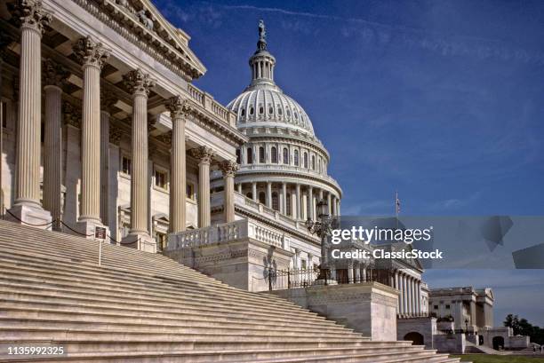 CAPITOL BUILDING WITH HOUSE OF REPRESENTATIVES IN FOREGROUND WASHINGTON DC USA