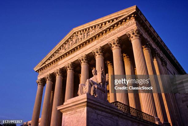 FRONT FACADE WITH STATUE OF AUTHORITY OF LAW SUPREME COURT BUILDING WASHINGTON DC USA