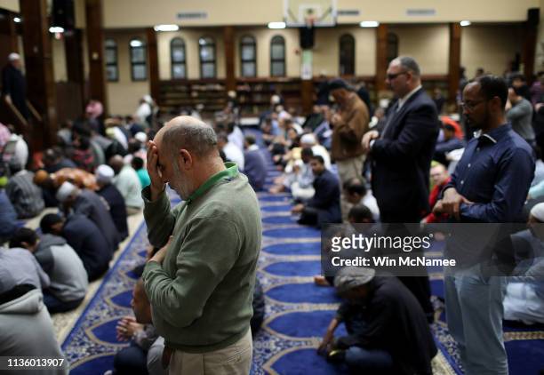 Muslim Americans take part in Friday prayers at the Dar Al Hijrah Islamic Center March 15, 2019 in Falls Church, Virginia. 49 people were killed in a...