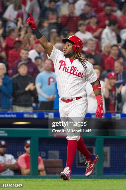 Maikel Franco of the Philadelphia Phillies reacts after hitting a solo home run in the bottom of the third inning against the Washington Nationals at...