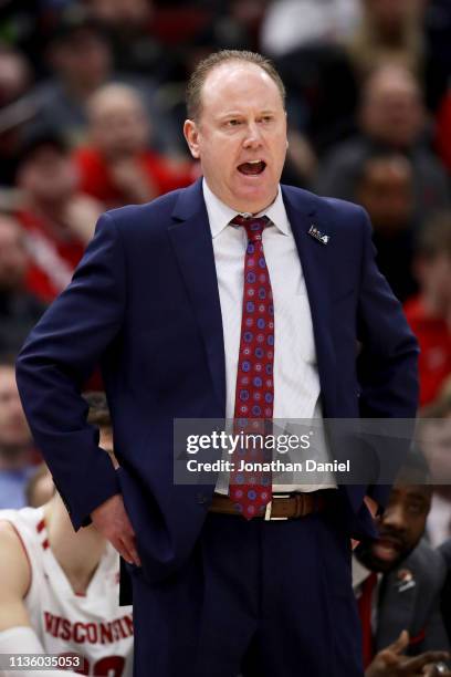 Head coach Greg Gard of the Wisconsin Badgers calls out instructions in the first half against the Nebraska Huskers during the quarterfinals of the...