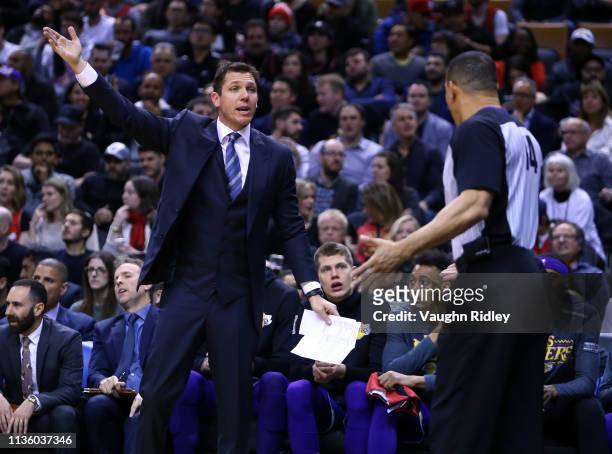 Head Coach Luke Walton of the Los Angeles Lakers speaks to an official during the second half of an NBA game against the Toronto Raptors at...