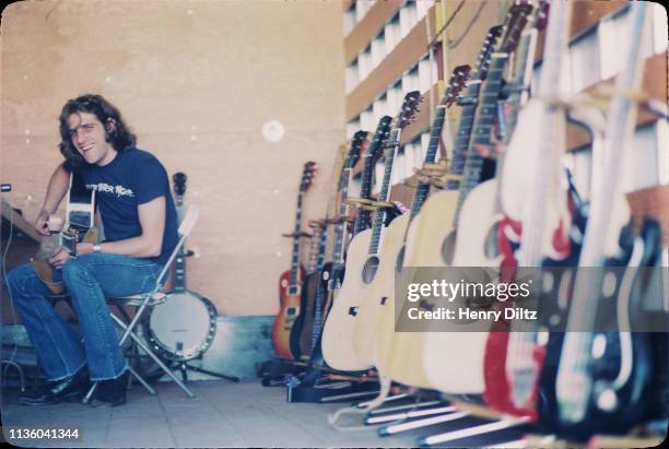 Glenn Frey of the Eagles tuning up at Anaheim Stadium, Sept 28 1975
