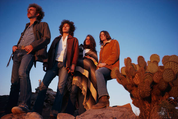 March 1972 --- The rock band The Eagles rest in a desert valley. The Eagles were the most popular band of the seventies and their reunion tour in the...