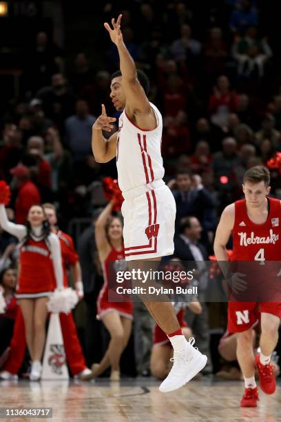 Mitrik Trice of the Wisconsin Badgers reacts in the second half against the Nebraska Huskers during the quarterfinals of the Big Ten Basketball...