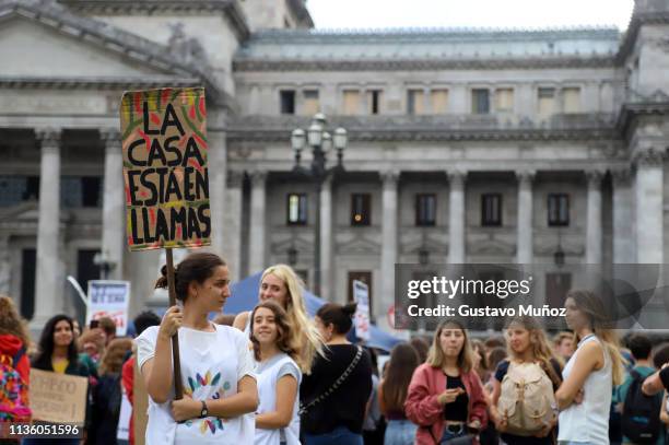 Young people protest during a demonstration as part of the Global Climate Strike campaign at National Congress of Argentina on March 15, 2019 in...