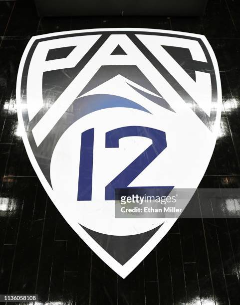 Pac-12 basketball logo is shown on the court before a semifinal game of the of the Pac-12 basketball tournament between the Colorado Buffaloes and...