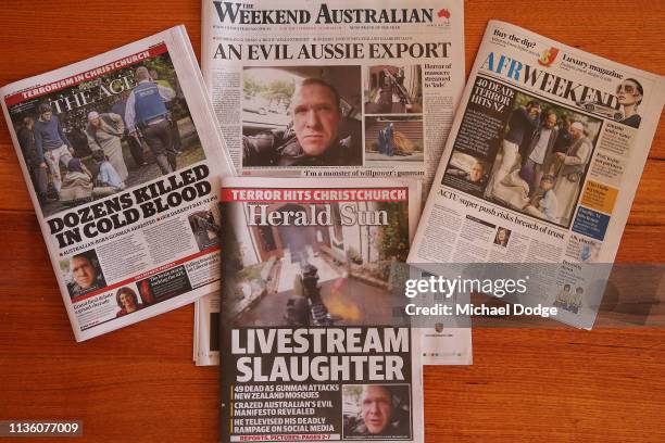 Newpapers in Melbourne are seen with reporting on the Christchurch mosque terror attacks on March 16, 2019 in Melbourne, Australia. At least 49...