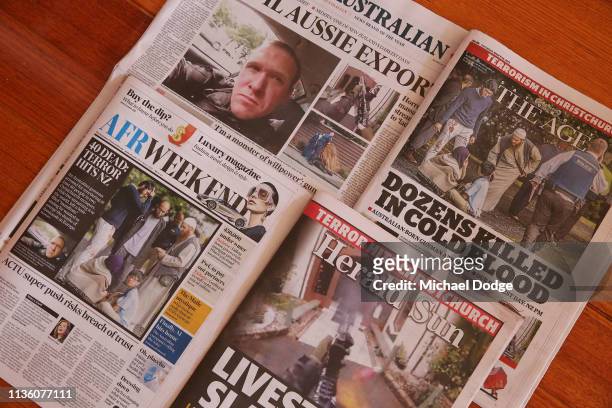 Newpapers in Melbourne are seen with reporting on the Christchurch mosque terror attacks on March 16, 2019 in Various Cities, Australia. At least 49...